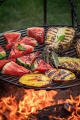 Homemade grilled watermelon and pineapple with herbs and spices.