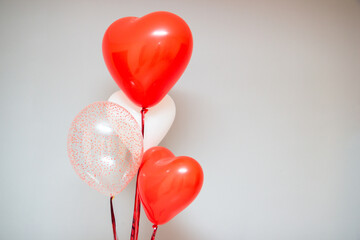 red balloons with heart shaped balloons