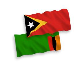 Flags of Republic of Zambia and East Timor on a white background