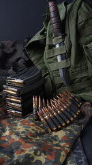 Fototapeta na wymiar Photo of 5.56mm ammunition, machine gun bullets belt, rifle ammunition in magazines