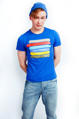 young handsome teenage hipster guy posing emotional, happy smiling against white background isolated, lifestyle people concept