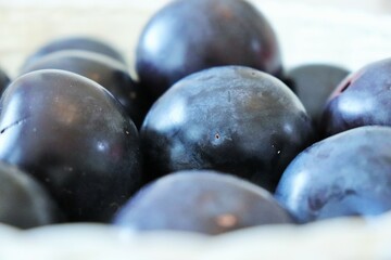 Fresh, sweet, ripe, plums. Macro Photo food fruit plums. Texture background of beautiful home plums. High quality photo.