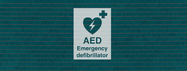 Green  brick wall with the inscription: AED Emergency defibrillator.
 - obrazy, fototapety, plakaty