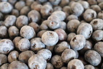 Fresh Blueberry background. Texture blueberry close up. Fresh summer berries. Top view. High quality photo