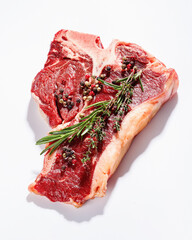 raw porterhouse beef steak on a white background