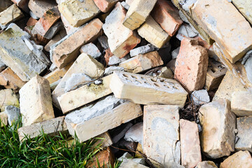A pile of old bricks near the plot.