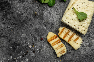 Grilled slices of halloumi cheese with grill marks and mint. Cyprus squeaky cheese. banner, menu, recipe place for text, top view