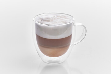  One cup of cappuccino coffee over white isolated background