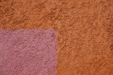 Painted wall in orange and pink