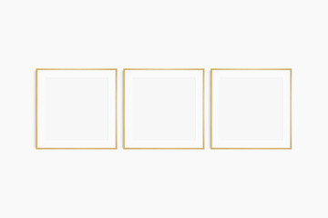 Frame mockup 1:1 square. Set of three thin oak wood frames. Clean, modern, minimalist, bright gallery wall mockup, set of 3 square frames with a mat opening.
