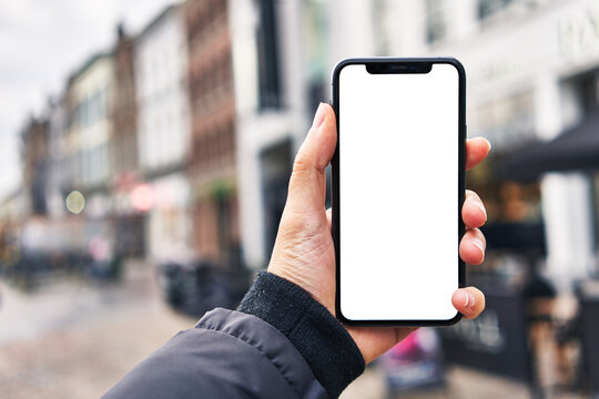  Hand Of Man Holding Smartphone At Street