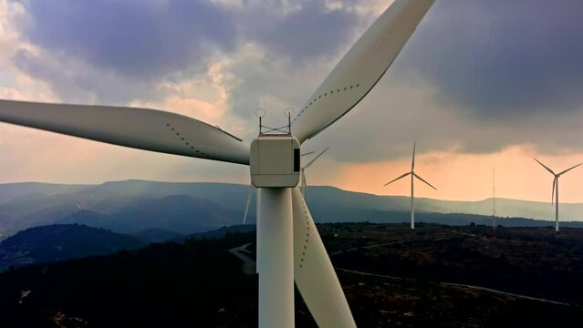 Wind power energy turbine industry farm aerial sunset