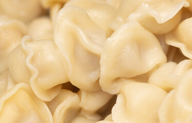 Boiled dumplings made from dough and meat.