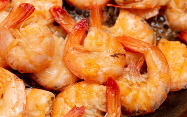 Close-up of boiled shrimp as background.