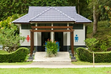 Toilet house in a green tropical park of Kuala Lumpur, Malaysia