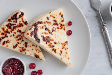 Leipajuusto - traditional Finnish baked cheese - with berries