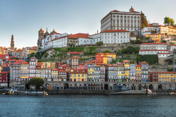 Fototapeta na wymiar Porto, Portugal old town skyline from across the Douro River at sunrise