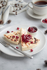 Leipajuusto - traditional Finnish baked cheese - with berries