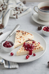 Leipajuusto - traditional Finnish baked cheese - with berries
