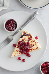 Leipajuusto - traditional Finnish baked cheese - with berries