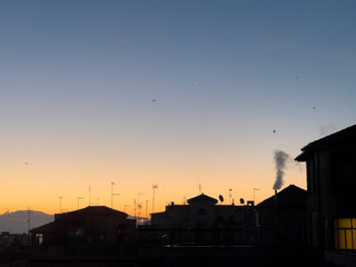 Naklejka premium Sunrise over apartments in Rome, Italy