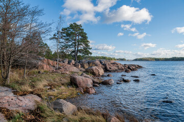 Fototapeta na wymiar Rocky coastal view and Gulf of Finland, trees, shore and sea, Kopparnas-Klobbacka area, Finland