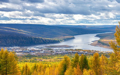 Fototapeta na wymiar View of the village of Tura - the administrative center of the Evenki district of the Krasnoyarsk Territory in autumn.