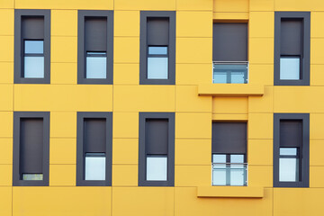 Obraz premium Urban architecture. Close up of facade of a residential building 