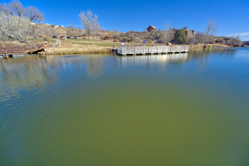 Fototapeta na wymiar Fain Lake Fishing Pier in Prescott Valley AZ