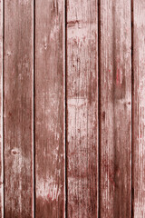 Weathered pink wooden boards background. Vertical vintage surface for mother's day greetings. Top view.
