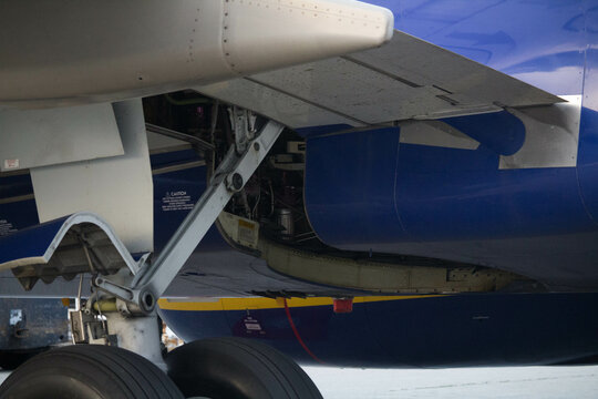 evocative image of the mechanical parts of an airliner during
checks before the flight