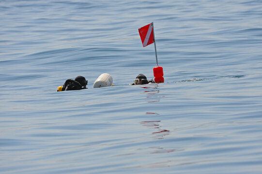 Dive Flag With Scuba Divers Heads.