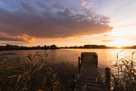 colorful sunset at the lake.	