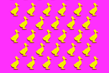 Plasticine figurines, yellow plasticine duck, pink background with yellow duck, toys, school, kindergarten 