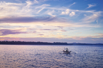 Seascape with philippines traditional fishing boat.