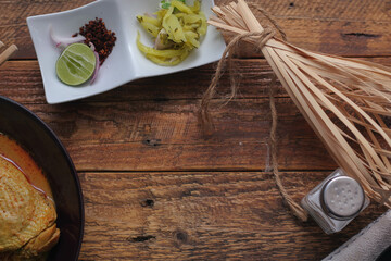 Northern Thai Style Curried Noodle Soup with Chicken or what we call in thai 