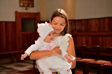 Portrait of children in church in front of altar with respirator on face