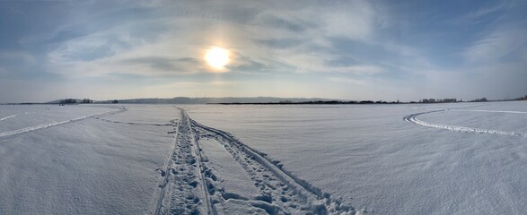 snowmobile tracks in the snow