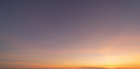Sunset sky. Abstract nature background. Dramatic blue with orange colorful clouds in twilight time.