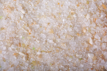 Pink Himalayan bath salt close-up. Spa and relaxation for the body. Wellness procedures.