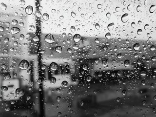 Raindrops that stick to the windshield of the car, when the rain just subsided in the city of Medan. 