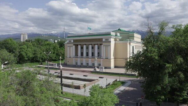 Opera and ballet Abay Theatre vide view at spring bright sunny day. Almaty city center aerial view with main city attractions. Historical center of Almaty city.