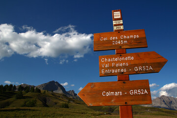 Signs for pedestrian routes in the Parc du Mercantour (Col des champs, Alpes-de-Haute-Provence, France)