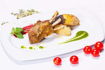 Special dish prepared by a restaurant chef. Composition with rice, lamb meat and tomato sauce