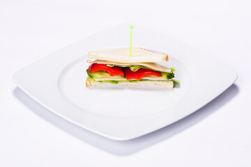 Plate made by a restaurant chef. Composition with salad made out of avocado, pepper and cheese