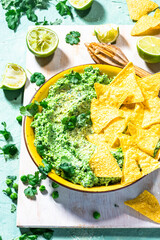 Green Pea guacamole with nachos. Avocado alternative healthy party food