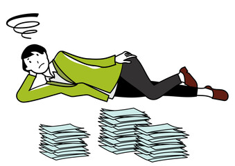 積み重なった書類を前に、横になってやる気をなくしているビジネスパーソン