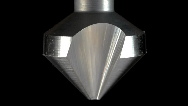 Super slow motion of rotation of a countersink Drill Bit for Metal.Extreme Close Up Zoom.Mechanical tools.professional tool concept.drilling tool.cuttin tools.metalworking industry.