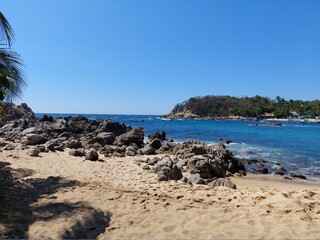 Fototapeta na wymiar Oceanview and rocks in Playa Manzanillo