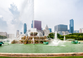 Buckingham Memorial Fountain in the center of Grant Park and Chicago skyline on background,...
